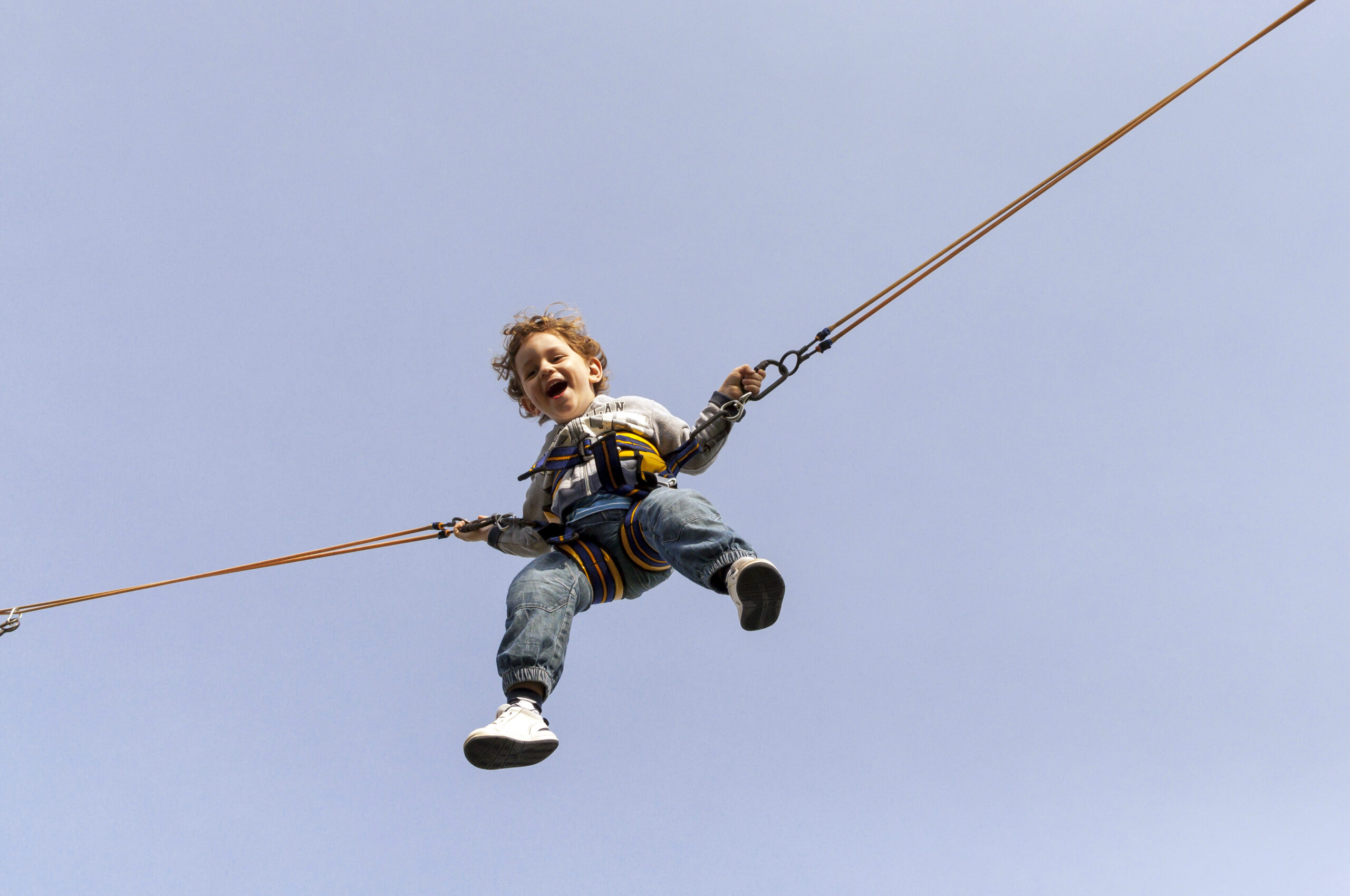 Boy,Jumping,On,Trampoline